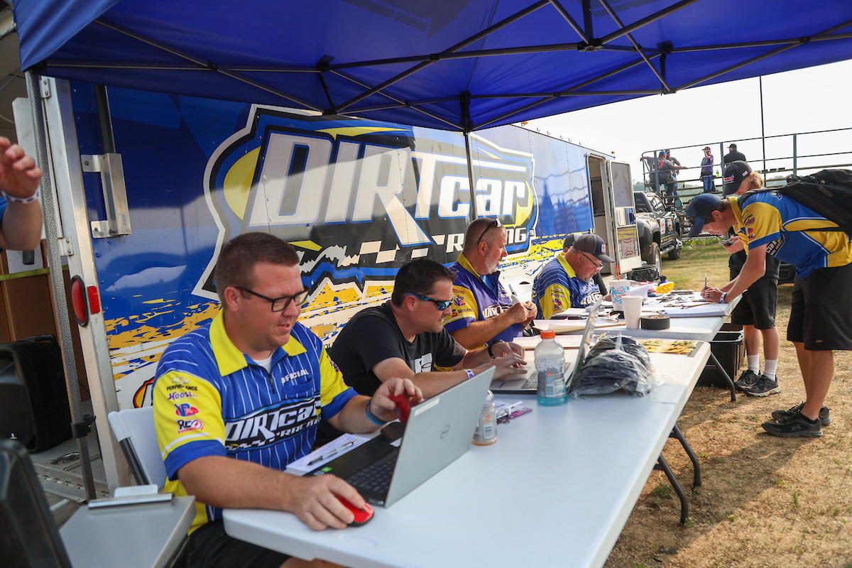 DIRTcar Officials register drivers before a dirt race event