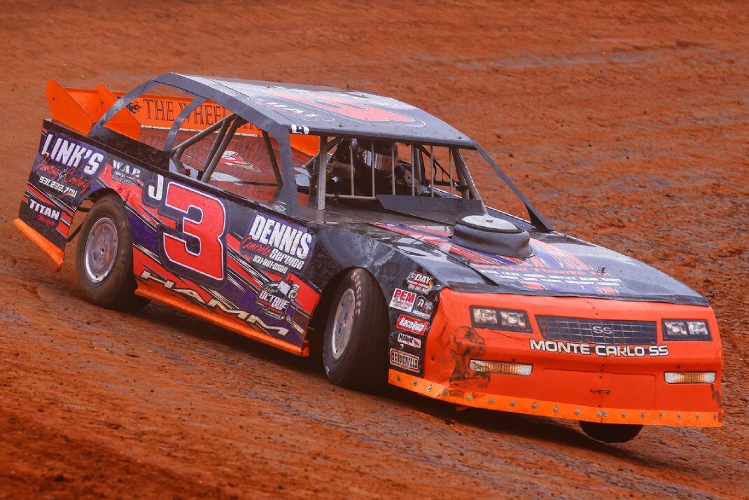 A DIRTcar Street Stock  takes a lap during Hot Laps at a dirt racing event